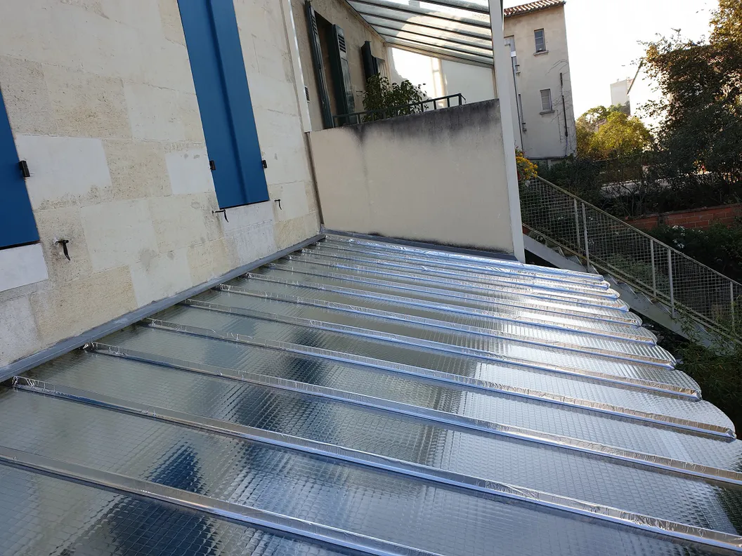Rénovation d'une marquise en verre armé