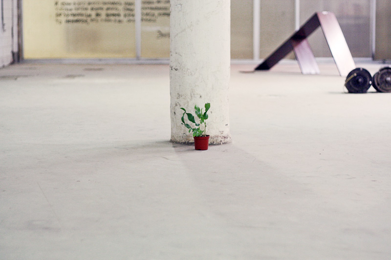 General view of the exhibition. Background: Ilya Budraitskis, "The Condition of the Working Class in England", Black marker on glass, 2009; Arseny Zhilyaev, "Lost", Found furniture, 2009