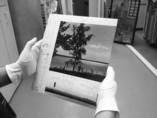 Agency of Singular Investigations (Anna Titova, Stanislav Shuripa) Studying documentation ("Clown" A. Rodchenko, 1938, reverse side), 2016