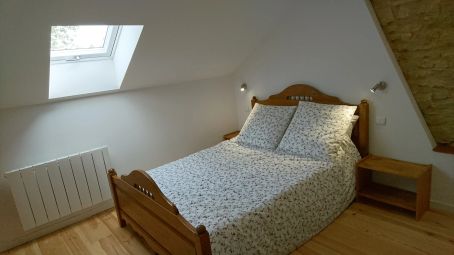 Un lit deux place en chambre Modigliani