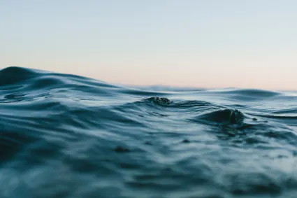 Body of water under blue and white skies 1533720