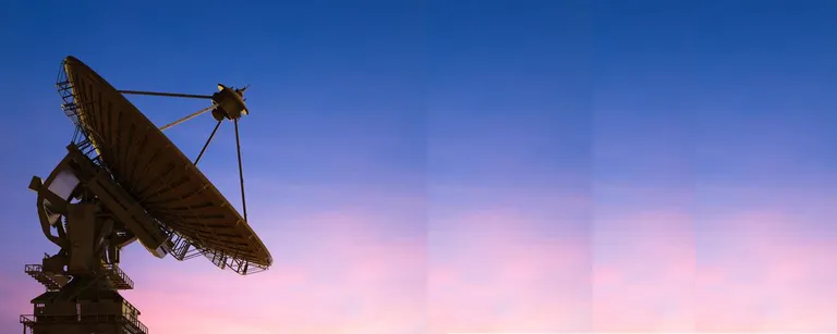 Stock photo satellite dish with twilight sky