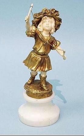 G flamand early 20th century french school a bronze and ivory figure of a young girl playing diabolo 