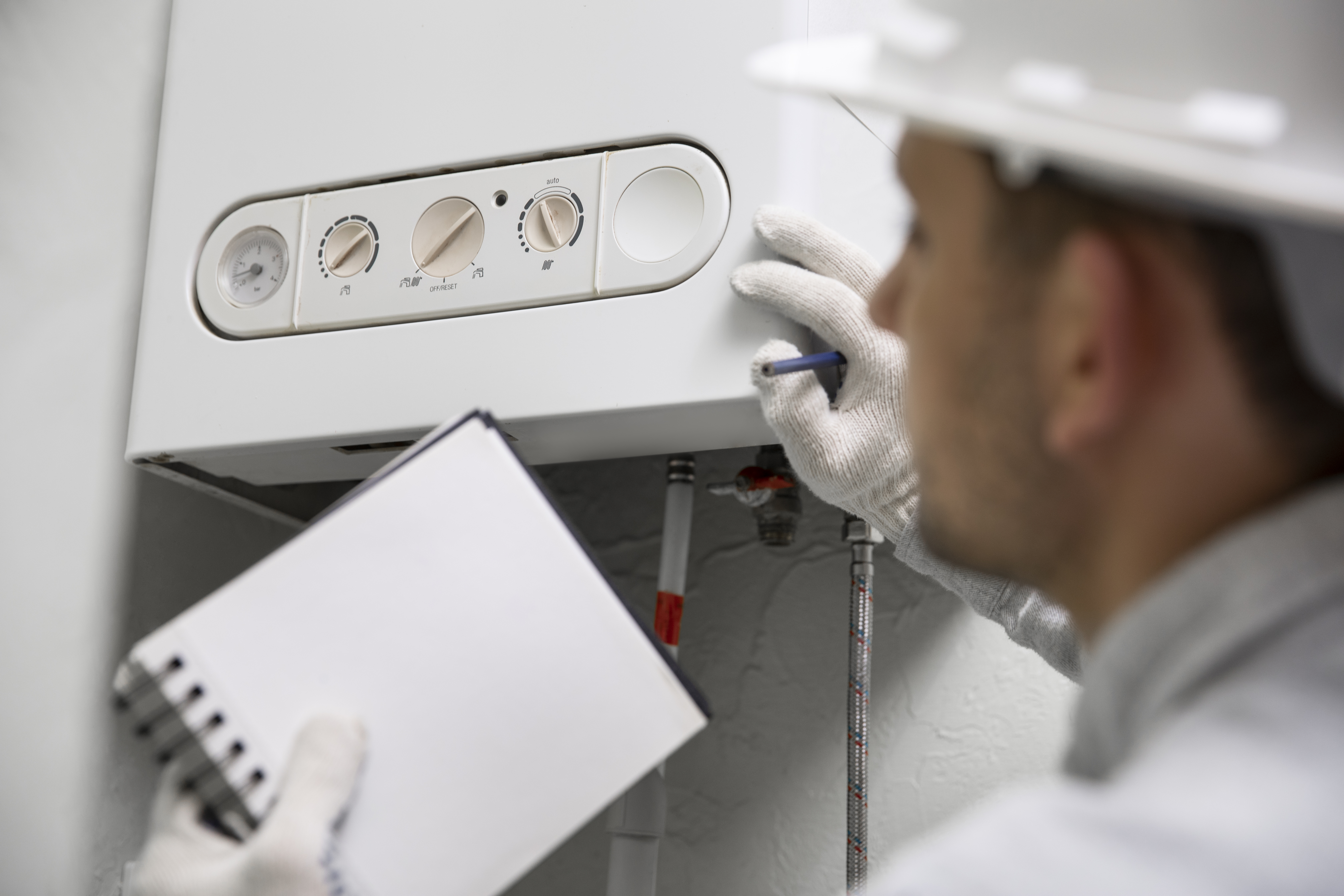 Worker-repairing-water-heater