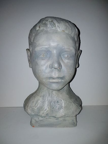 André Vereecken kind klei sculptuur
