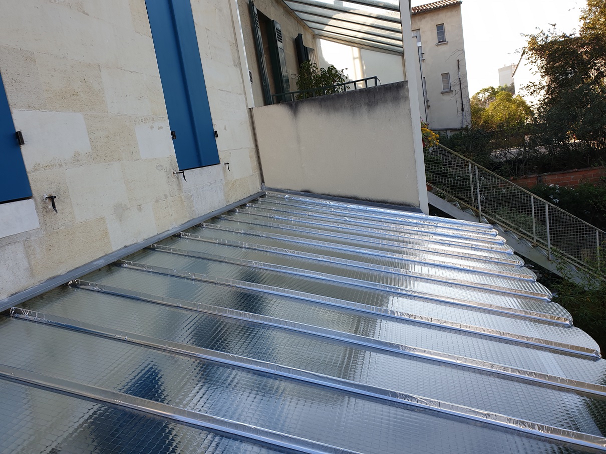 Rénovation d'une marquise en verre armé