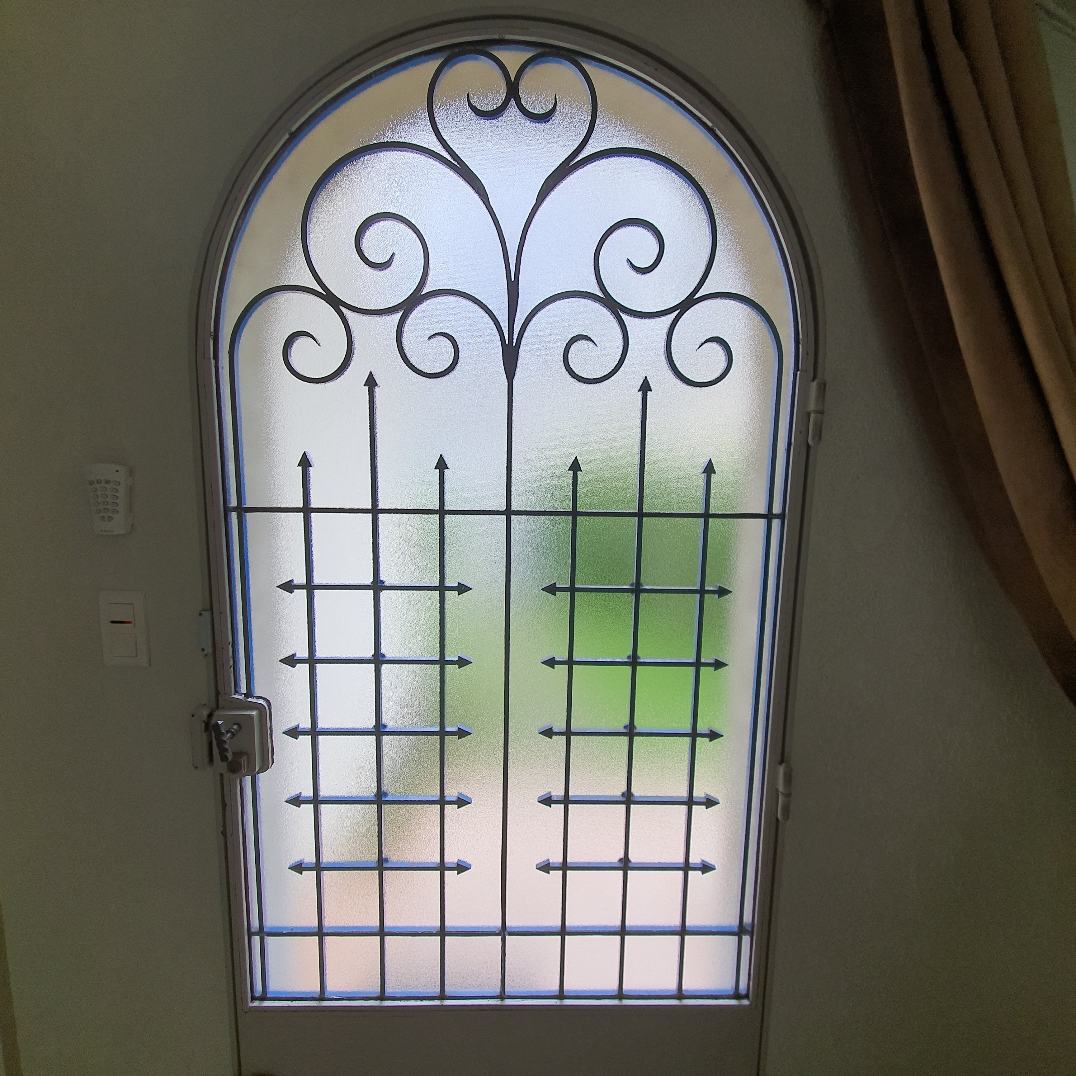 Rénovation d'une porte en fer forgée