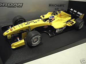 Fabricant : MINICHAMPS
Marque : Jordan Ford
Type : EJ14
Année : 2004
Echelle : 1/18
Couleur : Jaune/Noir
Matière : MT
Référence fabricant : 100040095
Pilote :Nigel Mansell
Remarque : Parade Regent Street 
Prix : 75 euros