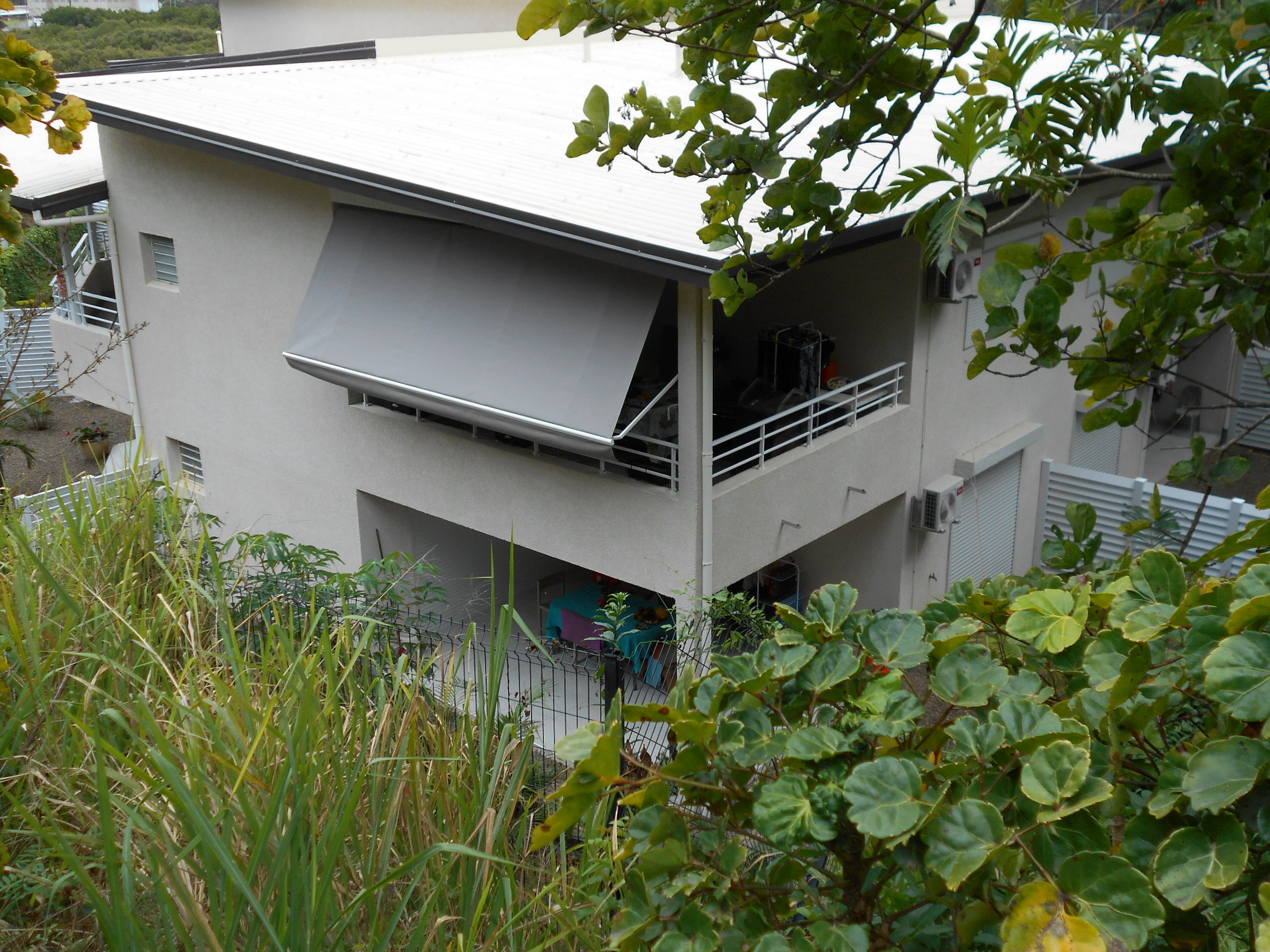 Store exterieur a bras pivotants 33 