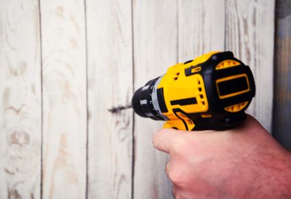 Cordless-drill-drill-wooden-background-1-