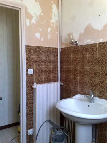 Remplacer radiateur eau chaude par seche serviette a bouguenais