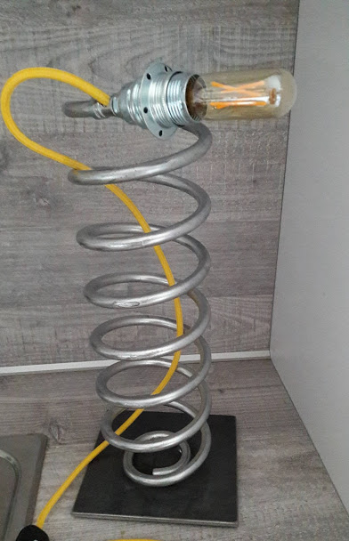 Ressort vertical me tal