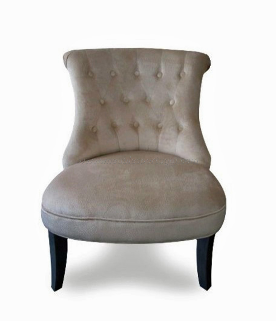 Fauteuil blanc capitonne