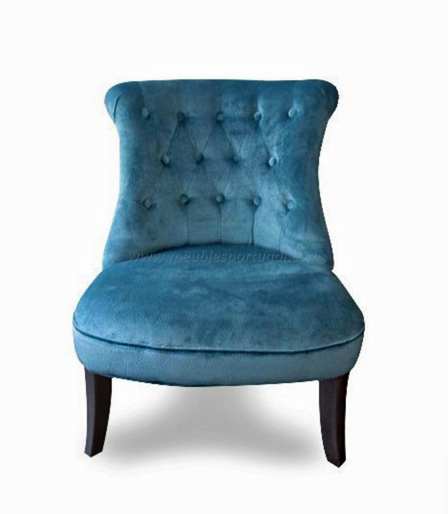 Fauteuil bleu capitonne