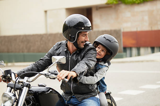 Father-and-son-riding-motorbike-1-