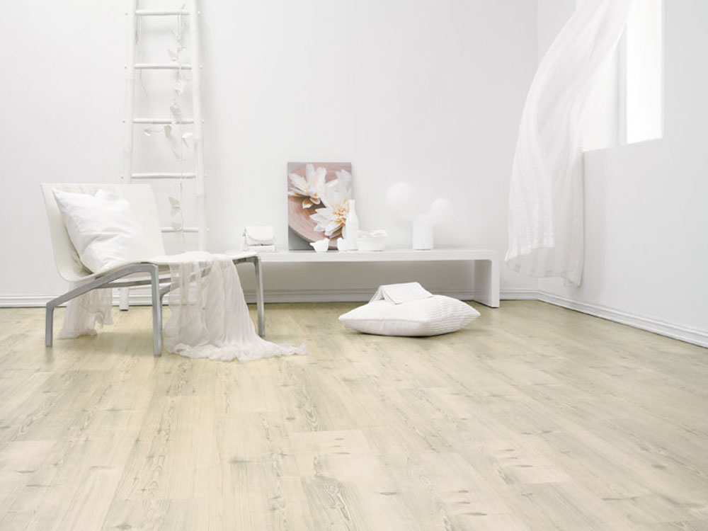 Pose d'un parquet stratifié de la marque BerryAlloc par la menuiserie FIXART à Lyon.