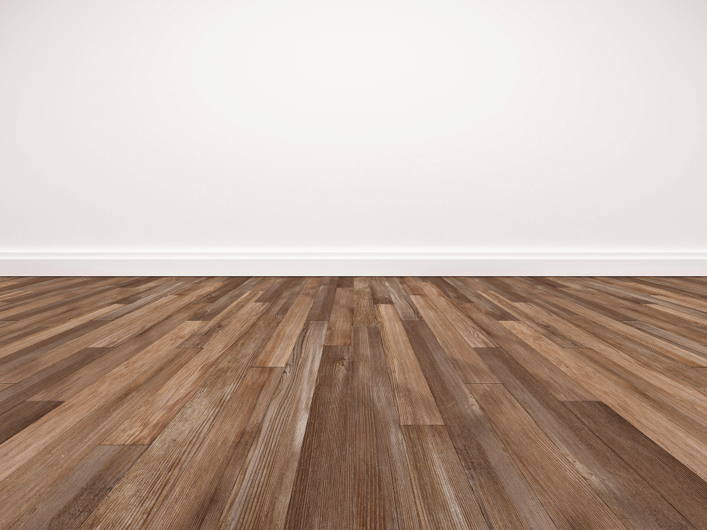 Pose d'un parquet massif en chêne sur une ossature flottante par la menuiserie FIXART à Lyon pour isoler thermiquement un plancher.