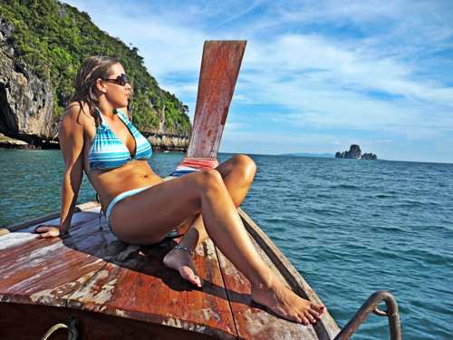 Beautiful girl longtail boat krabi