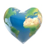 La terre en forme de coeur isole sur blanc