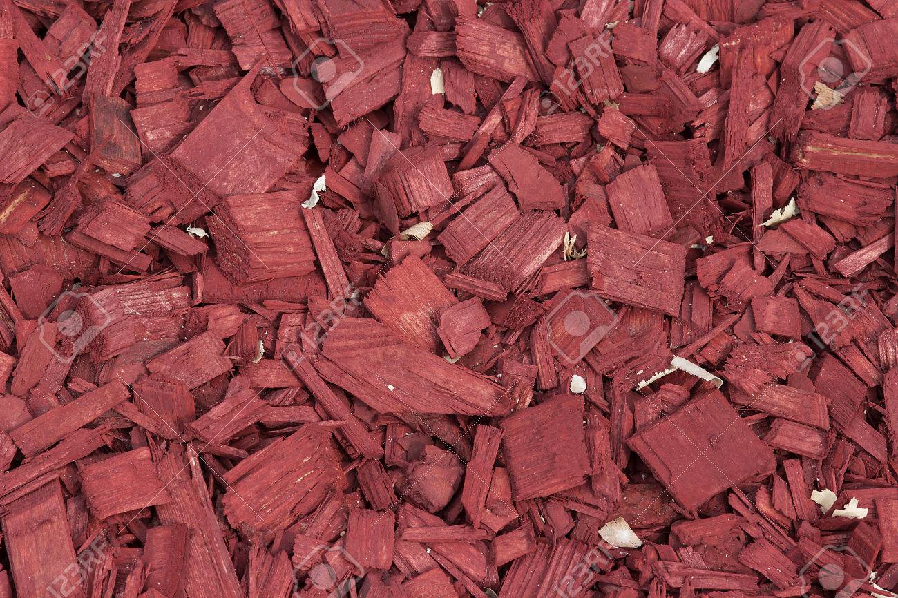 76769833 texture de copeaux de bois rouge fond decoratif en bois