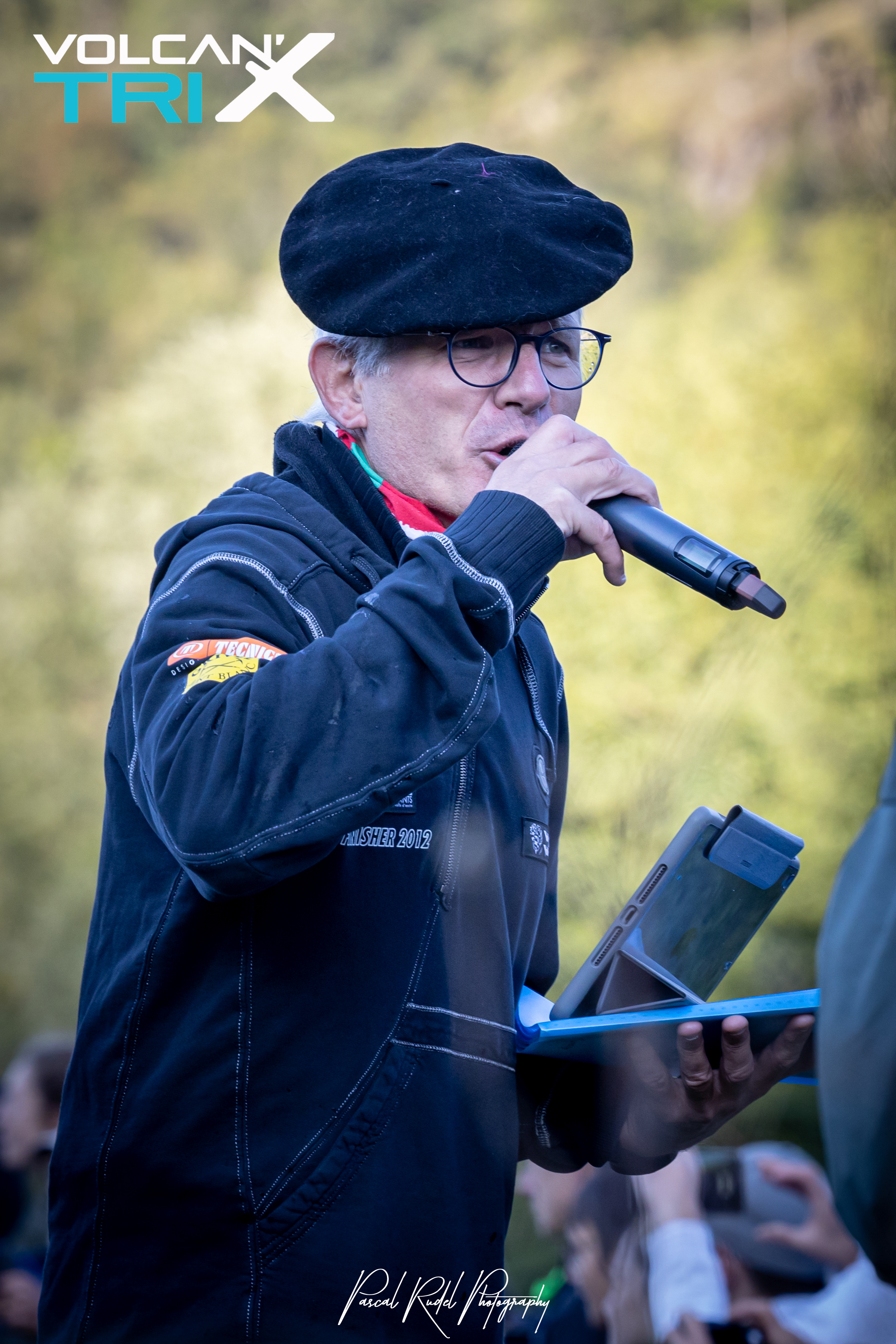 Volunteer speaker for the triathlon competition