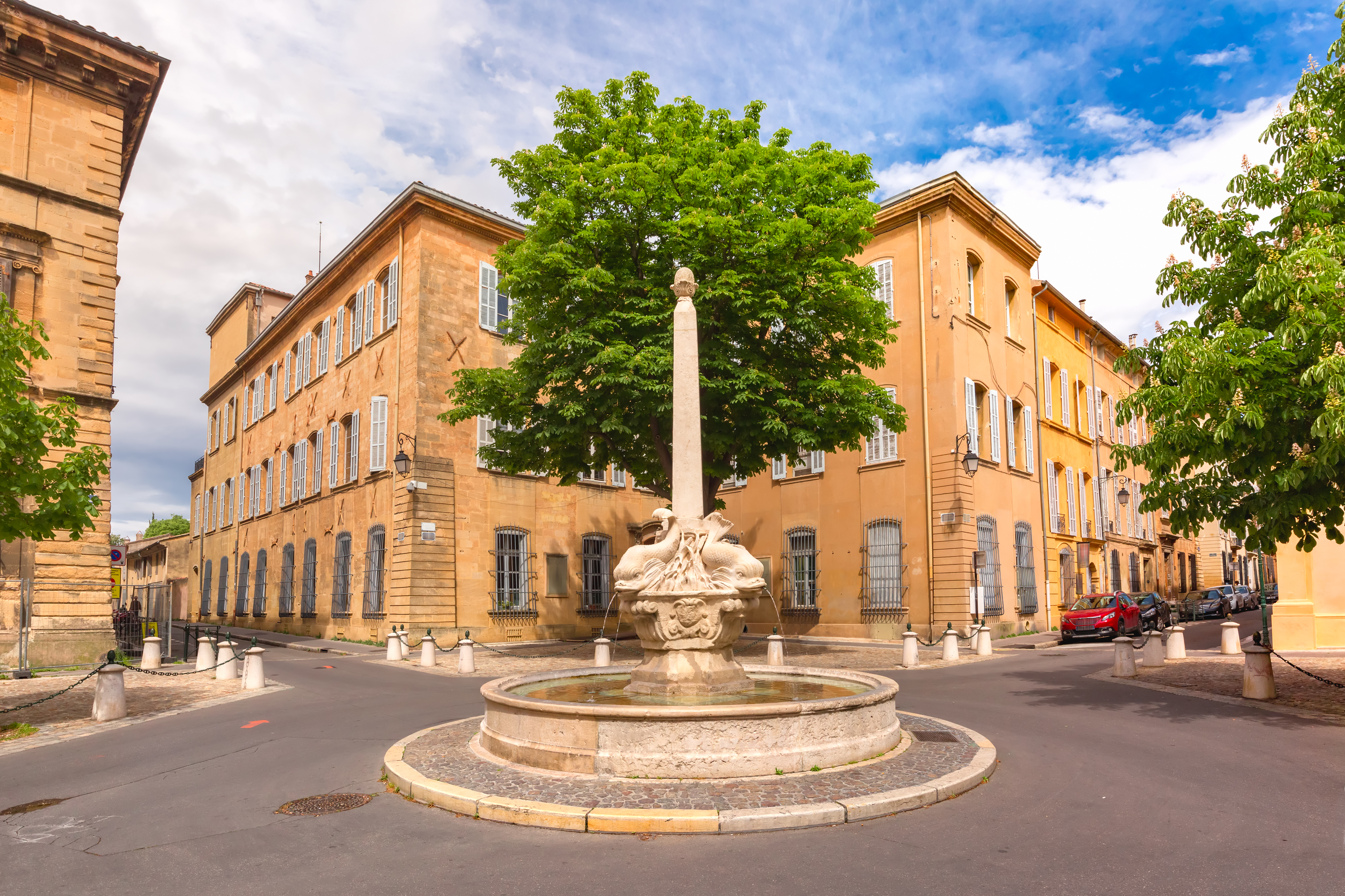 Fountain and square of quatre dauphins in the heart of the mazarin district aix provence provence southern france