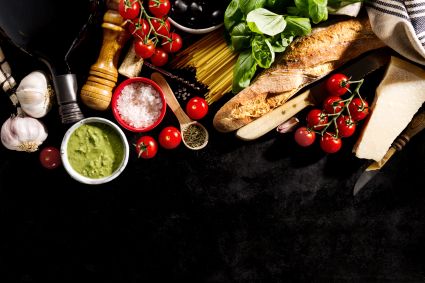 Tasty fresh appetizing italian food ingredients dark background ready cook home italian healthy food cooking concept toning