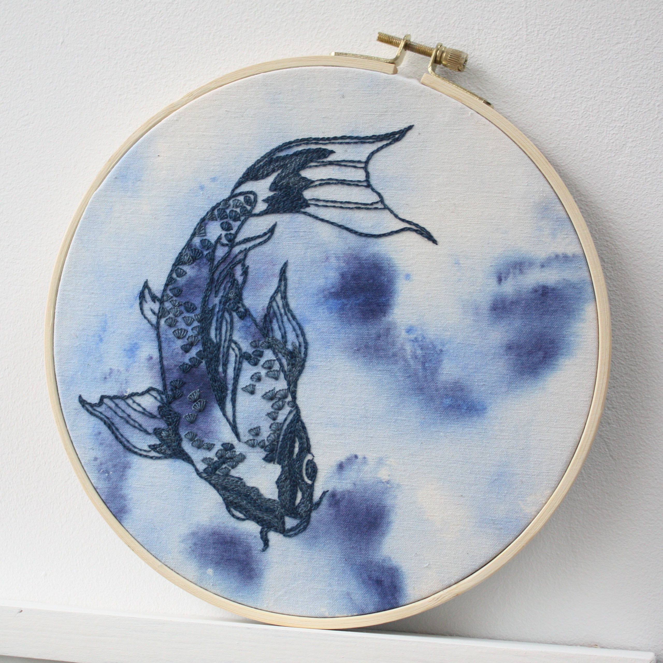 Broderie carpe