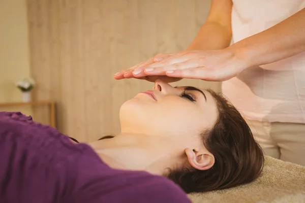 Depositphotos 81820802-stock-photo-young-woman-having-a-reiki