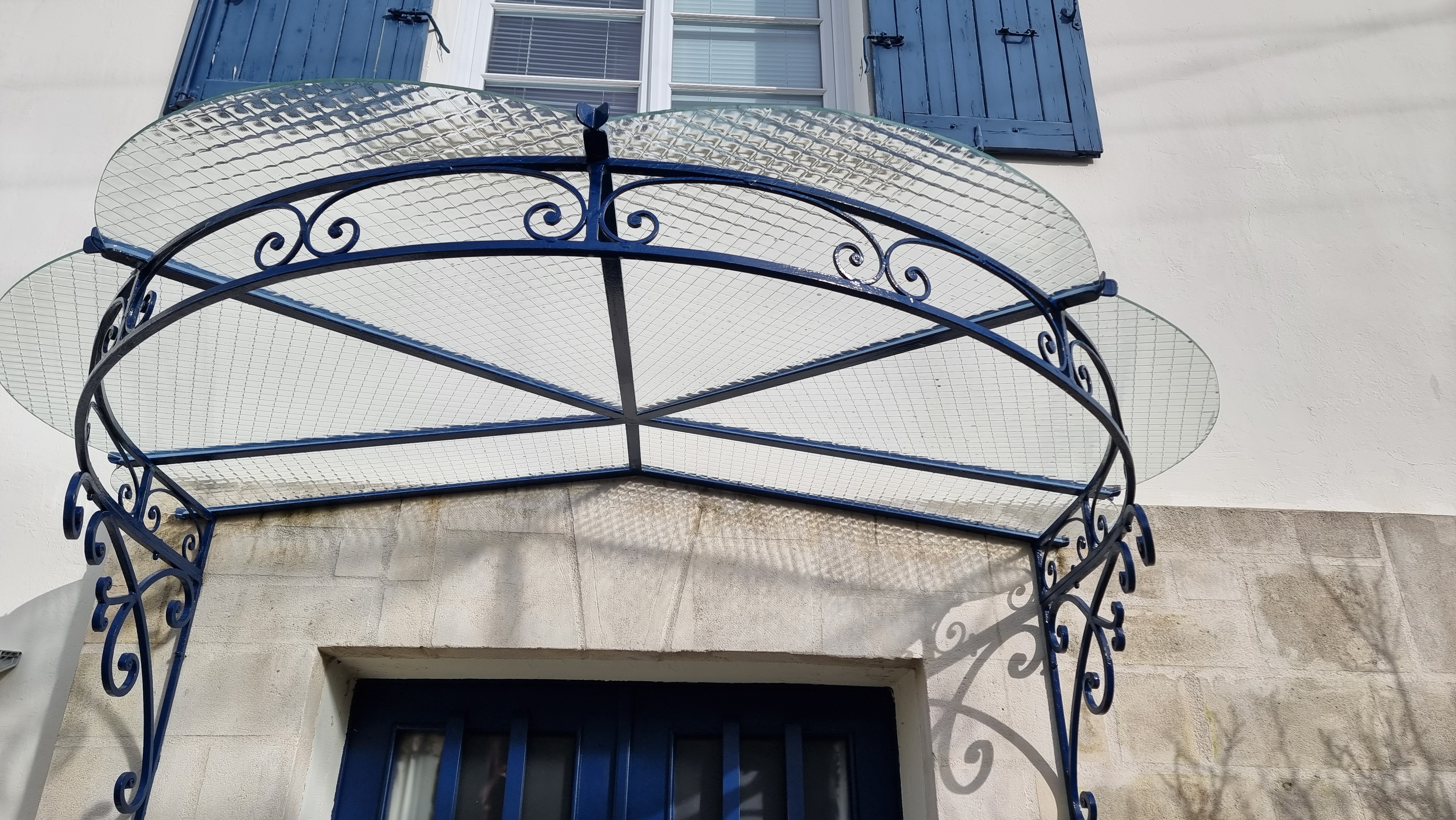 Réparation d'une marquise suite à une grèle