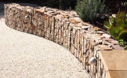 Curved gabion wall showing how the wall steps down along its length