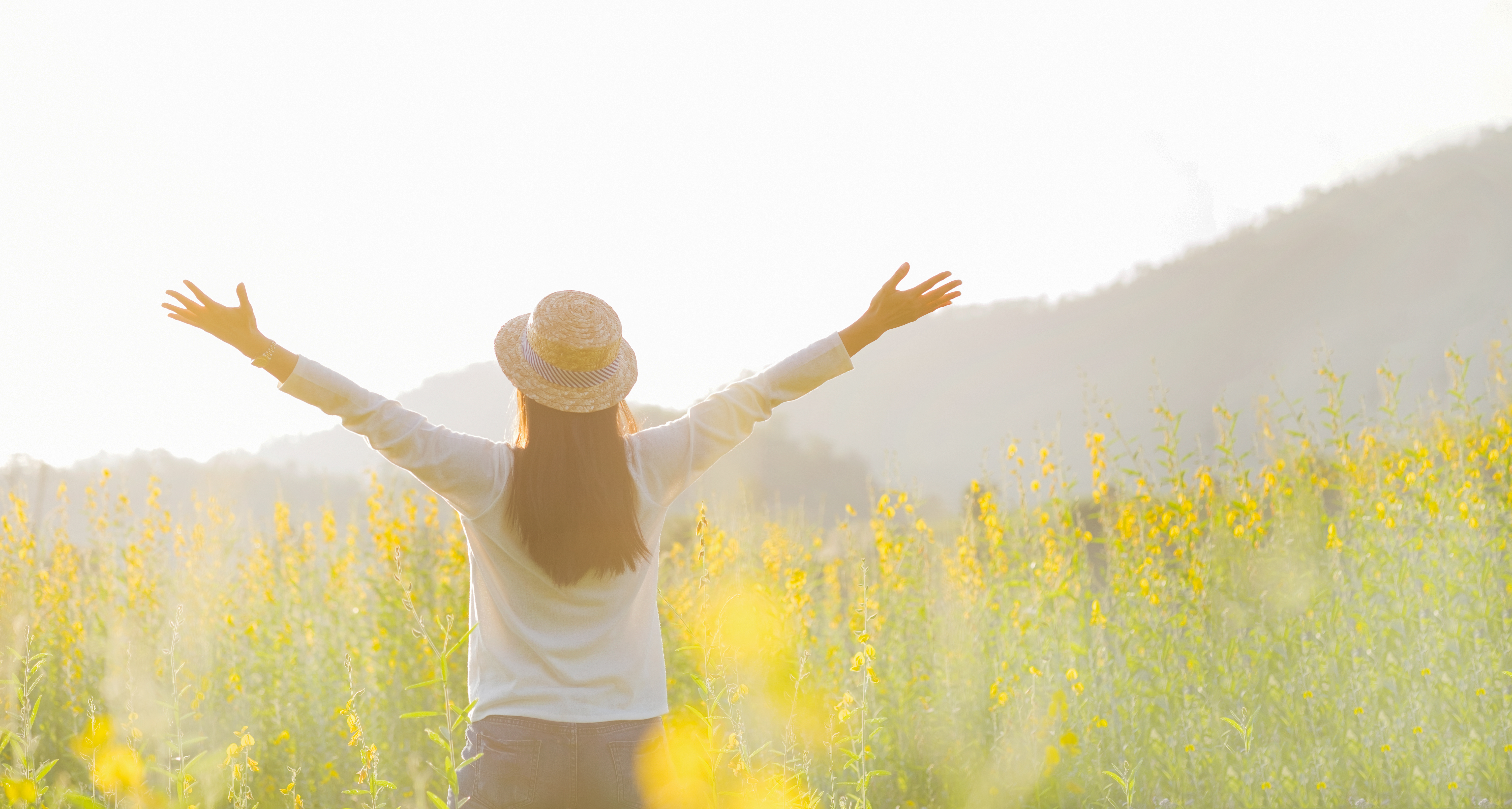 Female-teen-girl-stand-feel-freedom-relaxation-travel-outdoor-enjoying-nature-with-sunrise-1-