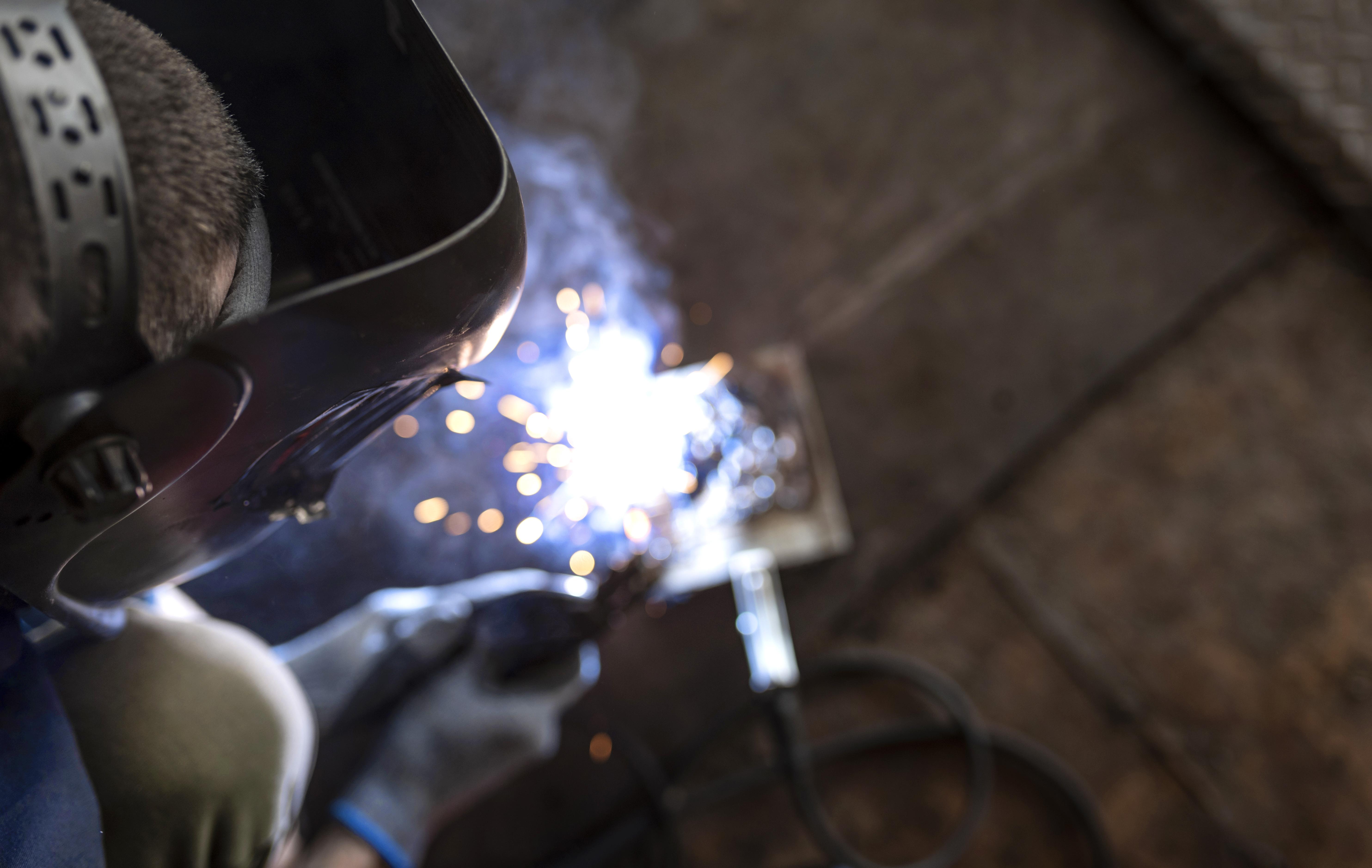 Male-mechanic-working-his-workshop