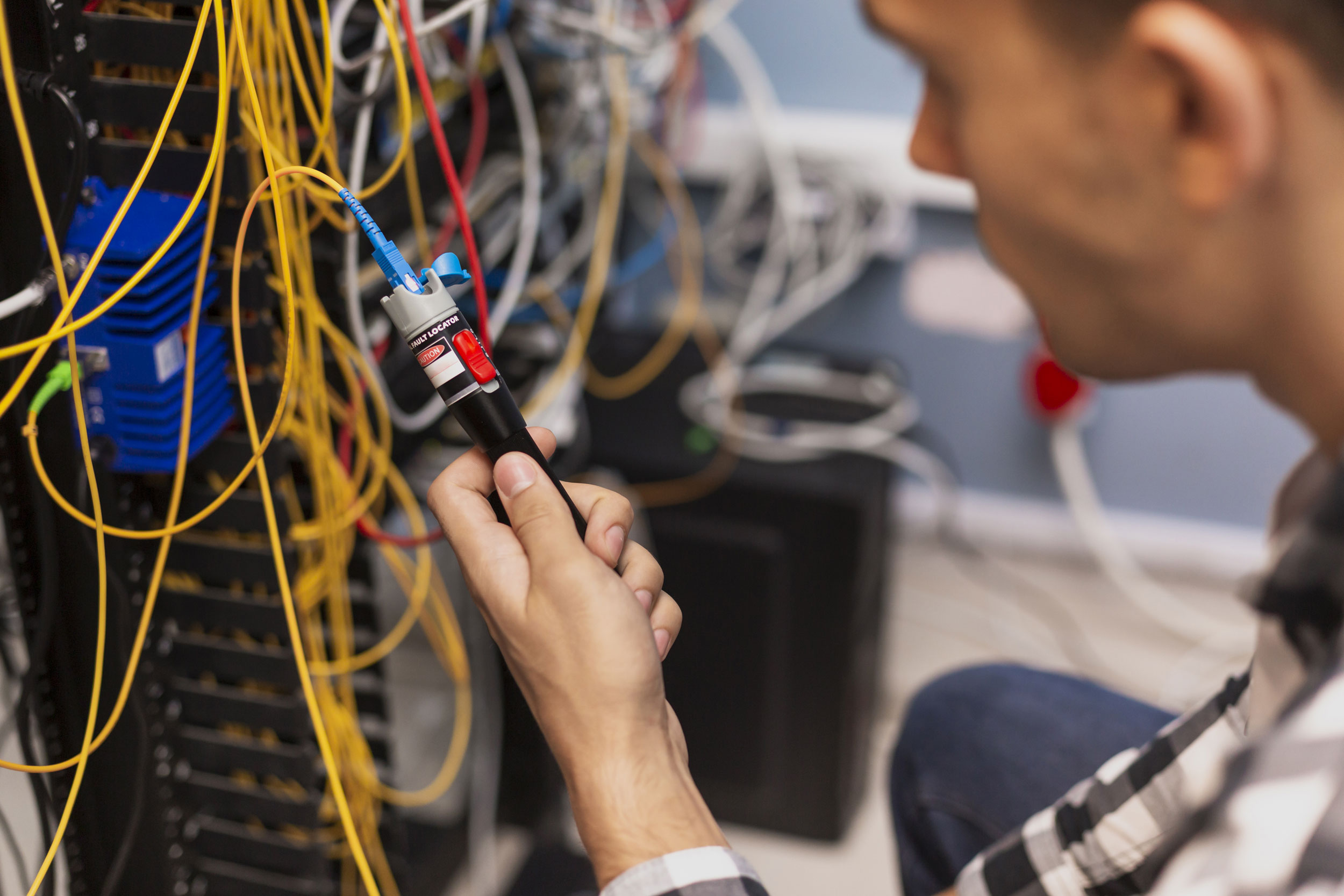 Engineer-man-testing-optical-fiber