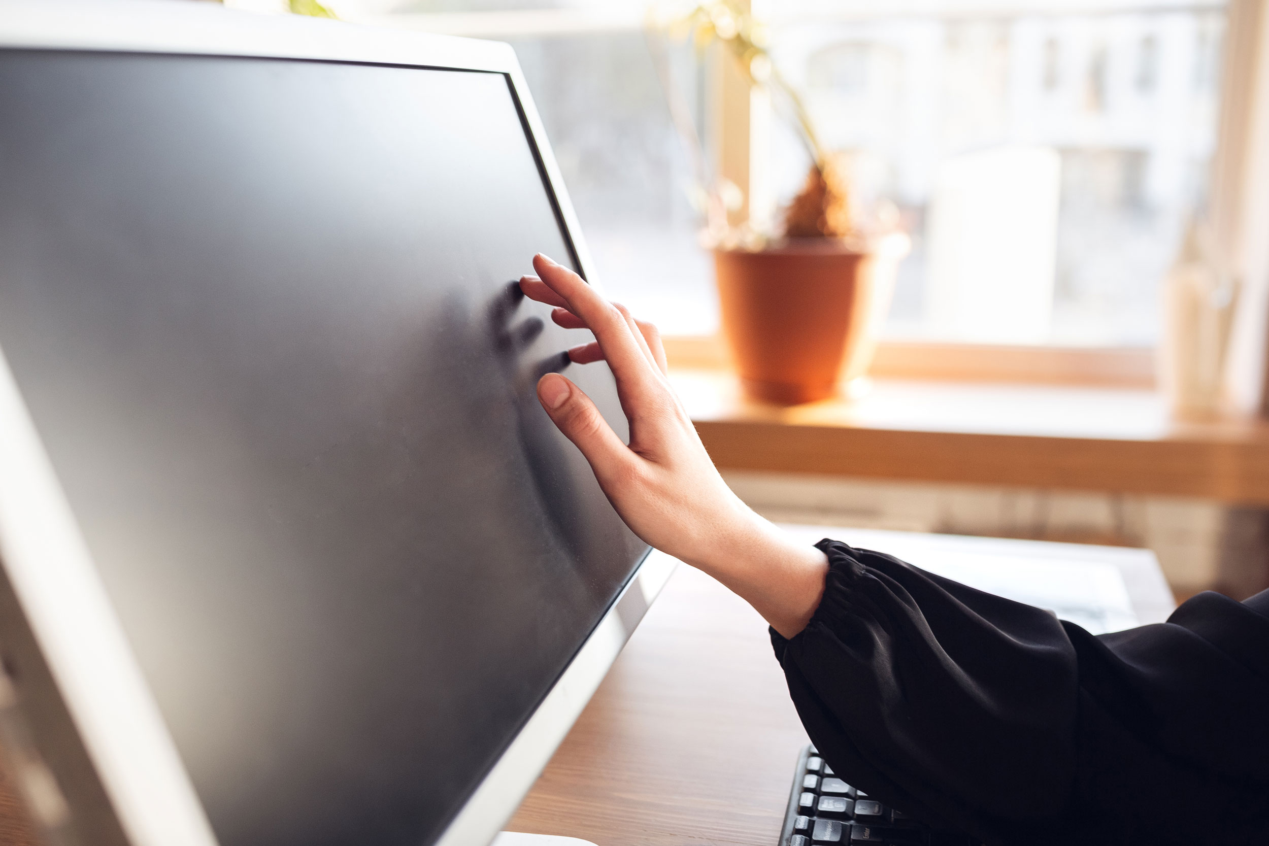 Touching-blank-screen-caucasian-young-woman-business-attire-working-office