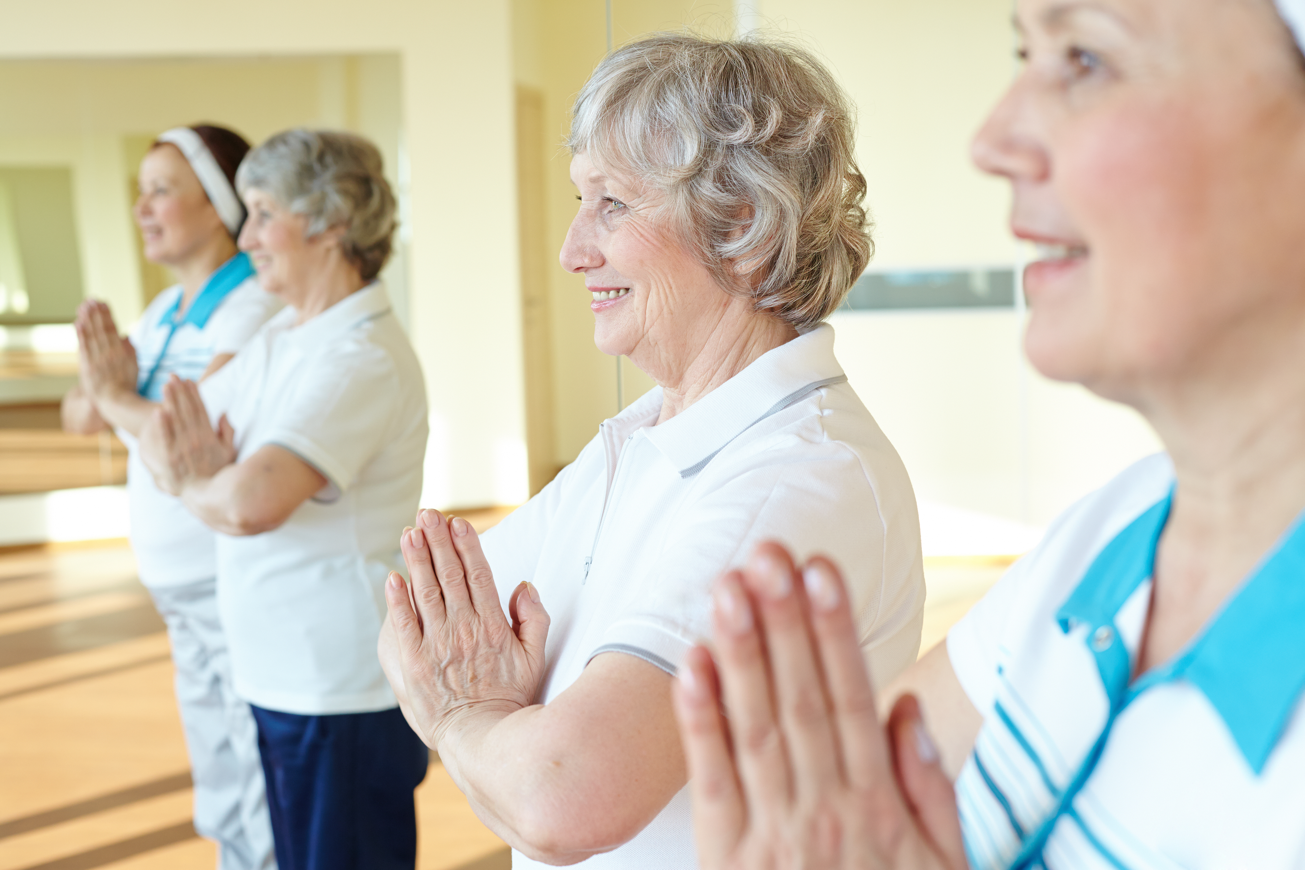 Close-up-women-doing-relaxation-exercises