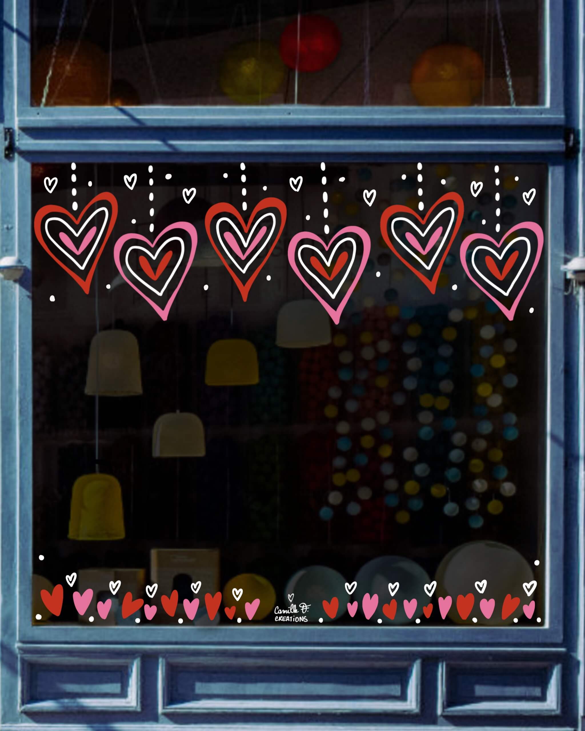 Vitrine peinte sur le thème de la Saint Valentin, de l'amour, avec des coeurs rose et rouge, à Paris ou dans les Yvelines