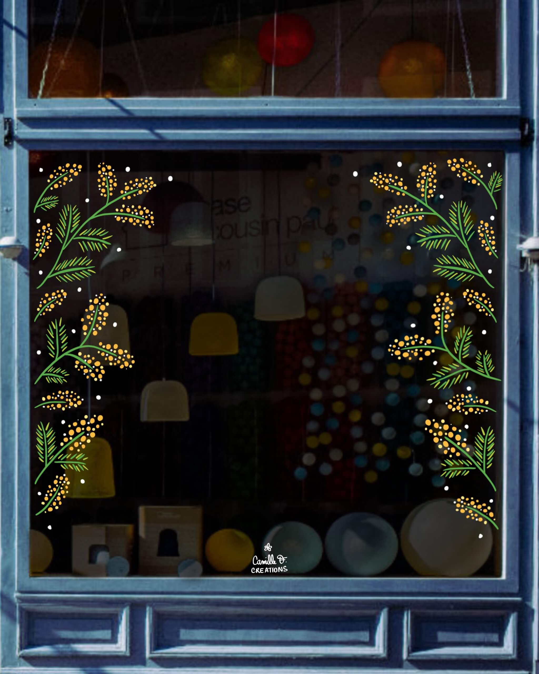 Peinture sur vitrine à Paris ou dans les Yvelines, représentant des branches de Mimosa de part et d'autre de la vitrine décorée