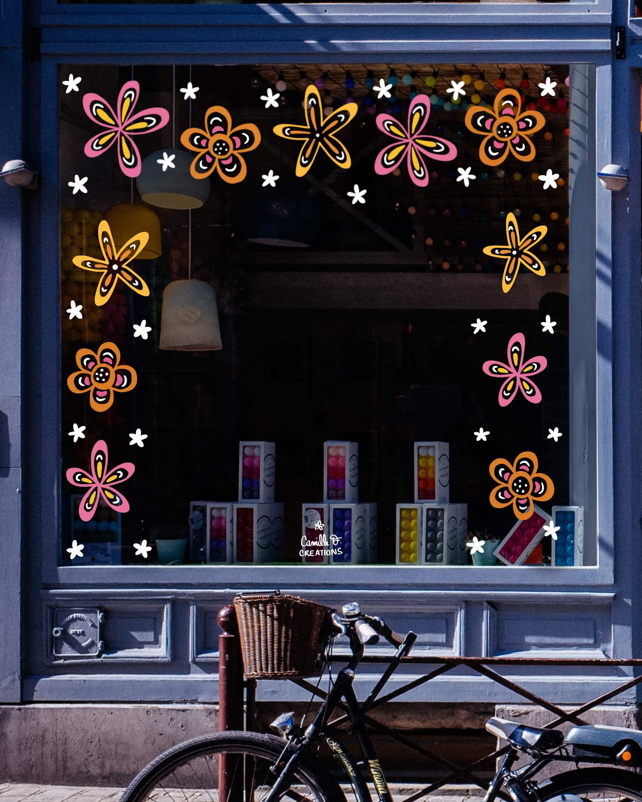 Peinture sur vitrine dans les Yvelines ou à Paris représentant des fleurs colorées vintage dans un style rétro années 60 ou 70