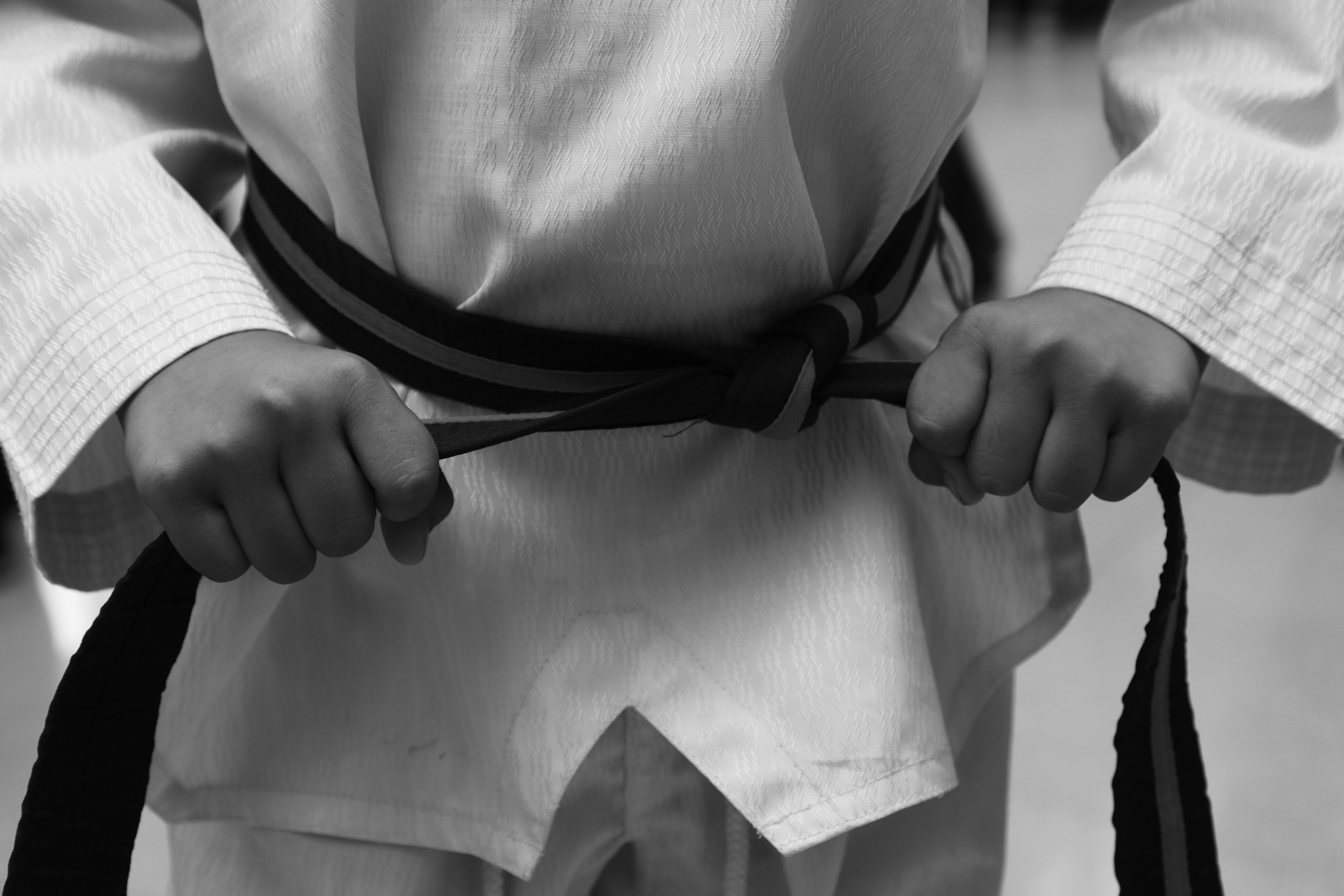 Midsection-man-wearing-karate-belt