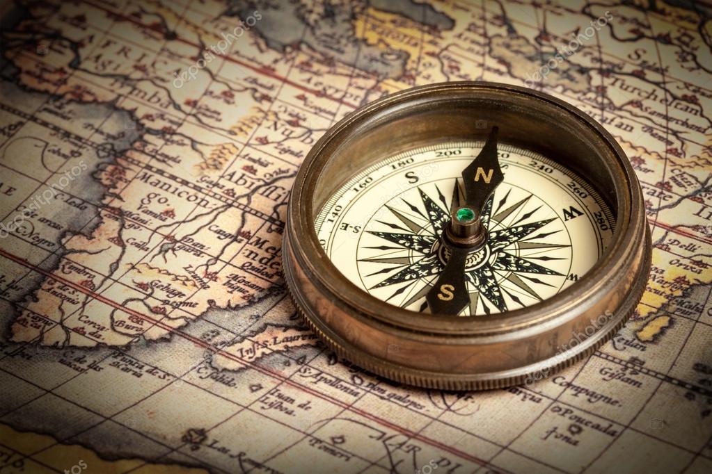 Depositphotos 13336187-stock-photo-old-vintage-compass-on-ancient