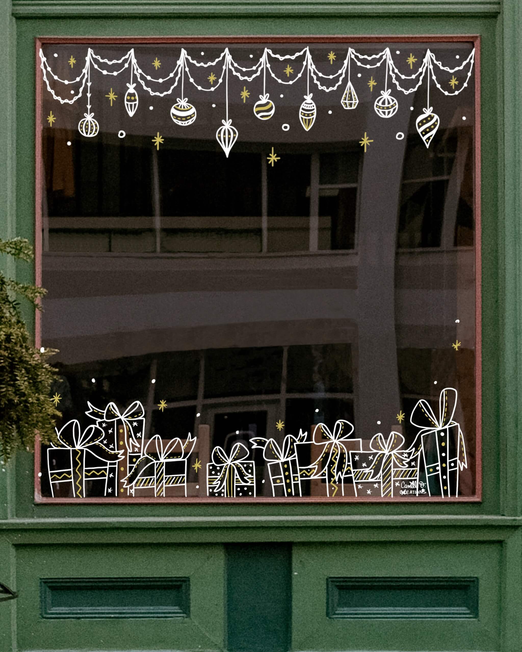 Peinture sur vitrine à Paris ou dans les Yvelines sur le thème de Noël avec des cadeaux décorée et des guirlandes. Décor en blanc et doré.