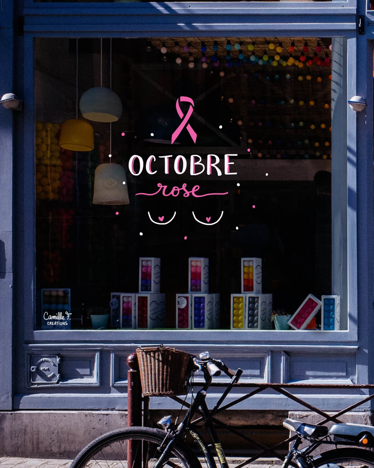 Peinture sur vitrine à Paris ou dans les Yvelines sur le thème Octobre Rose pour sensibiliser au Cancer du Sein.