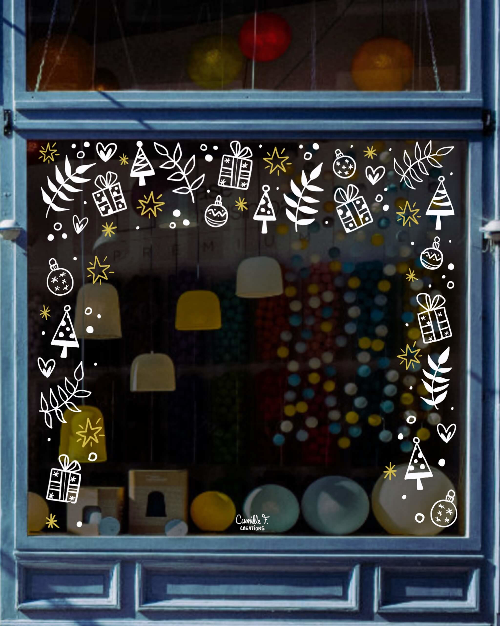 Peinture sur vitrine à Paris ou dans les Yvelines sur le thème de Noël avec plusieurs motifs évoquant Noël en blanc et doré.