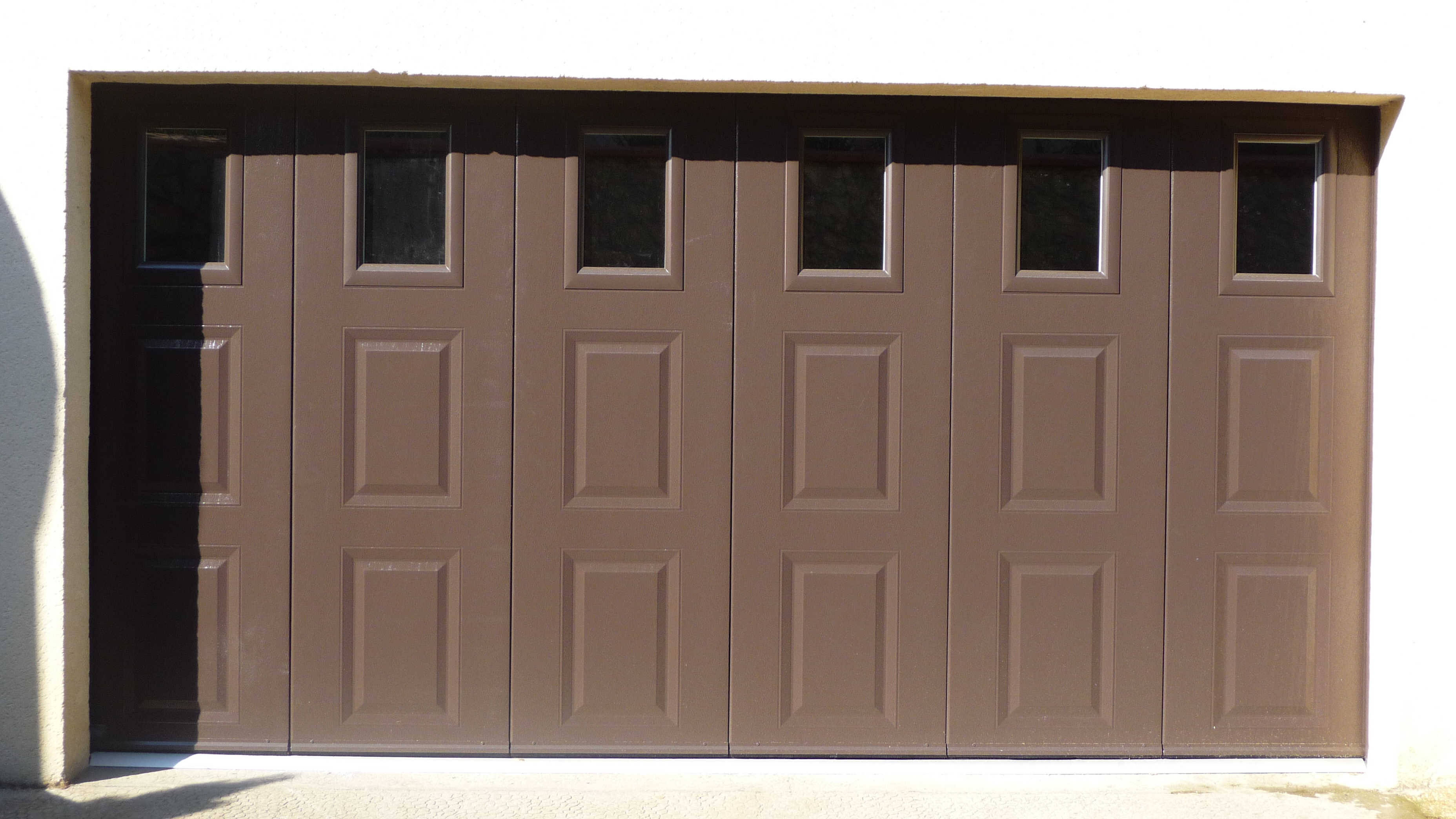 Porte sectionnelle laterale