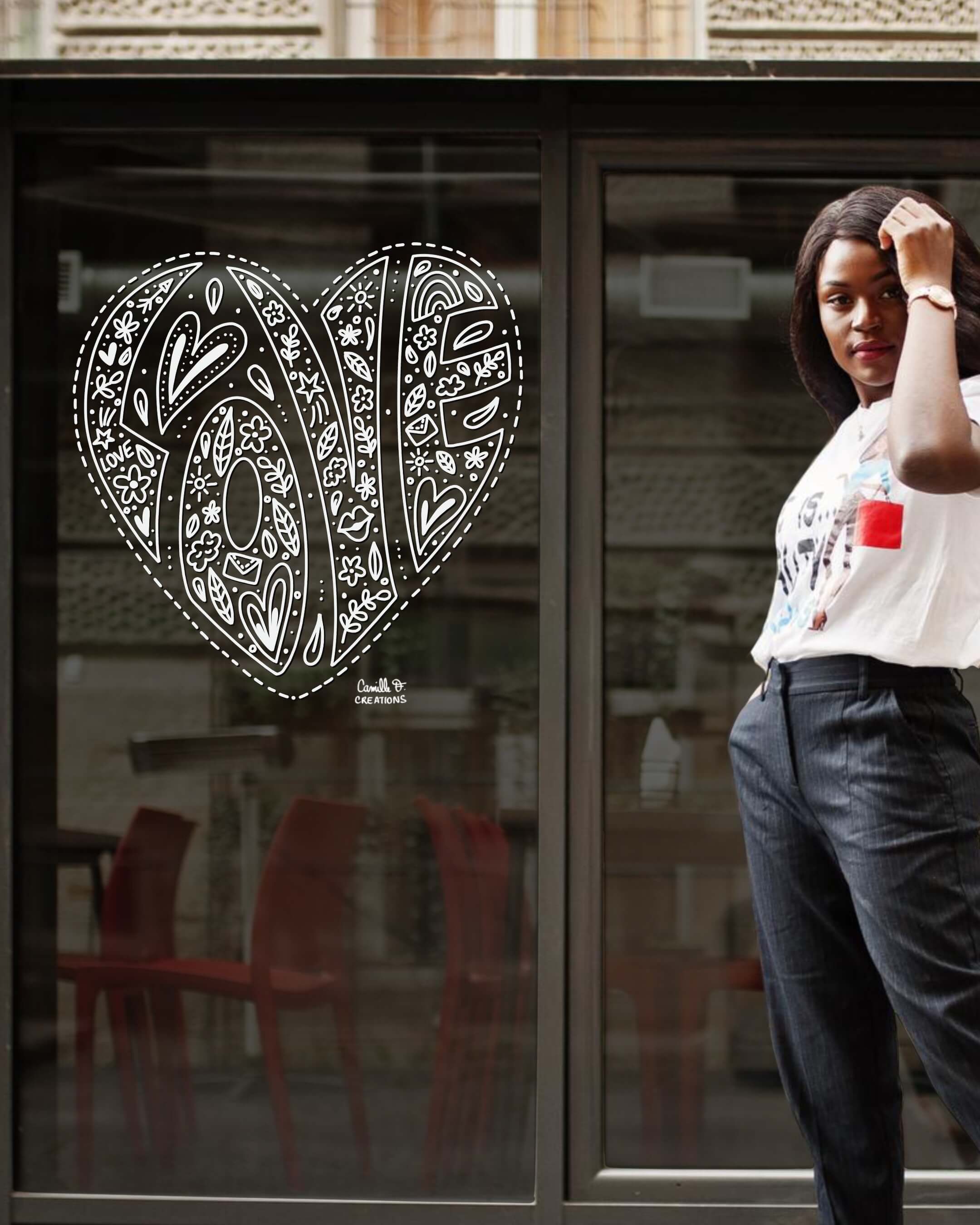 Peinture sur vitrine dans les Yvelines ou à Paris pour la Saint-Valentin représentant le mot Love en forme de coeur