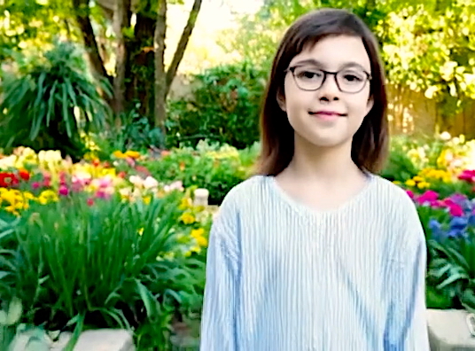 Eric-9-ans-cheveux-long-jardin