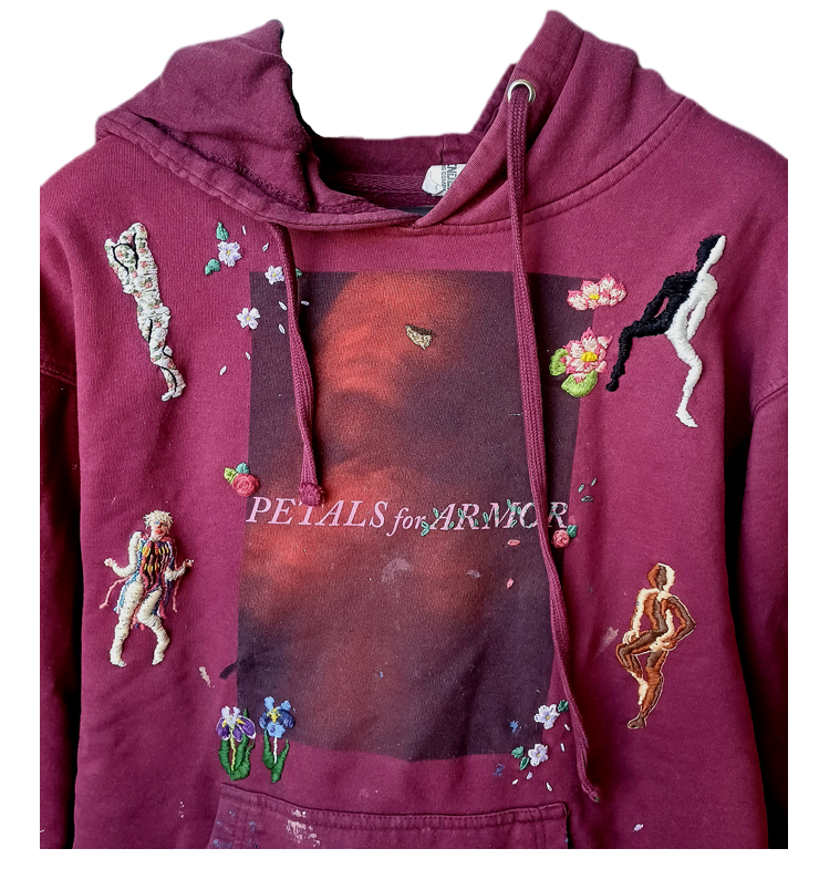 Pull merch de l'artiste Hayley Williams, chanteuse du groupe Paramore, pour son album Petals for Armor, brodé à la main de fleurs faisant référence à la chanson Roses/lotus/violet/iris et de personnages du clip de la chanson Cinnamon