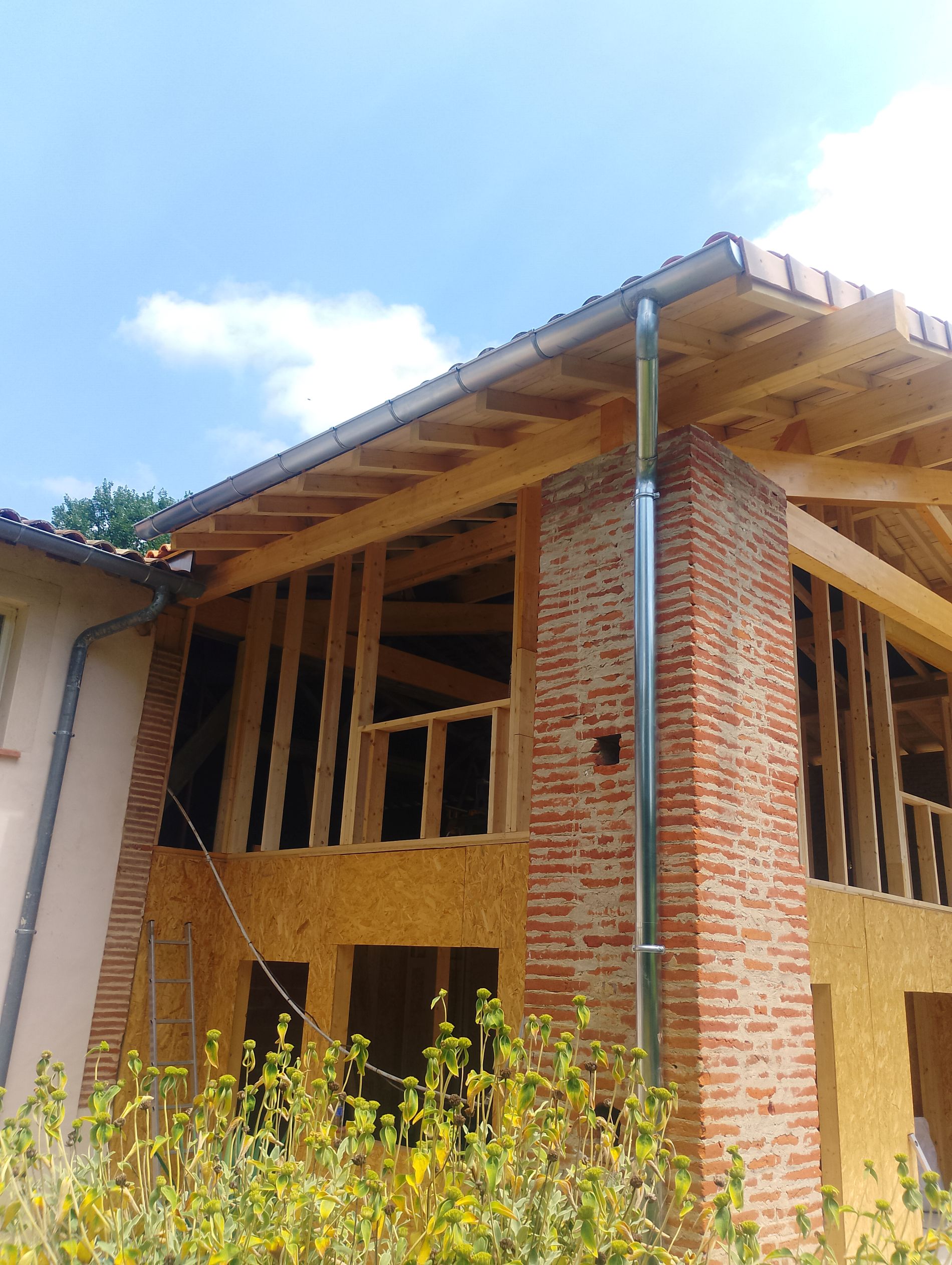 Construction ossature bois grange montech