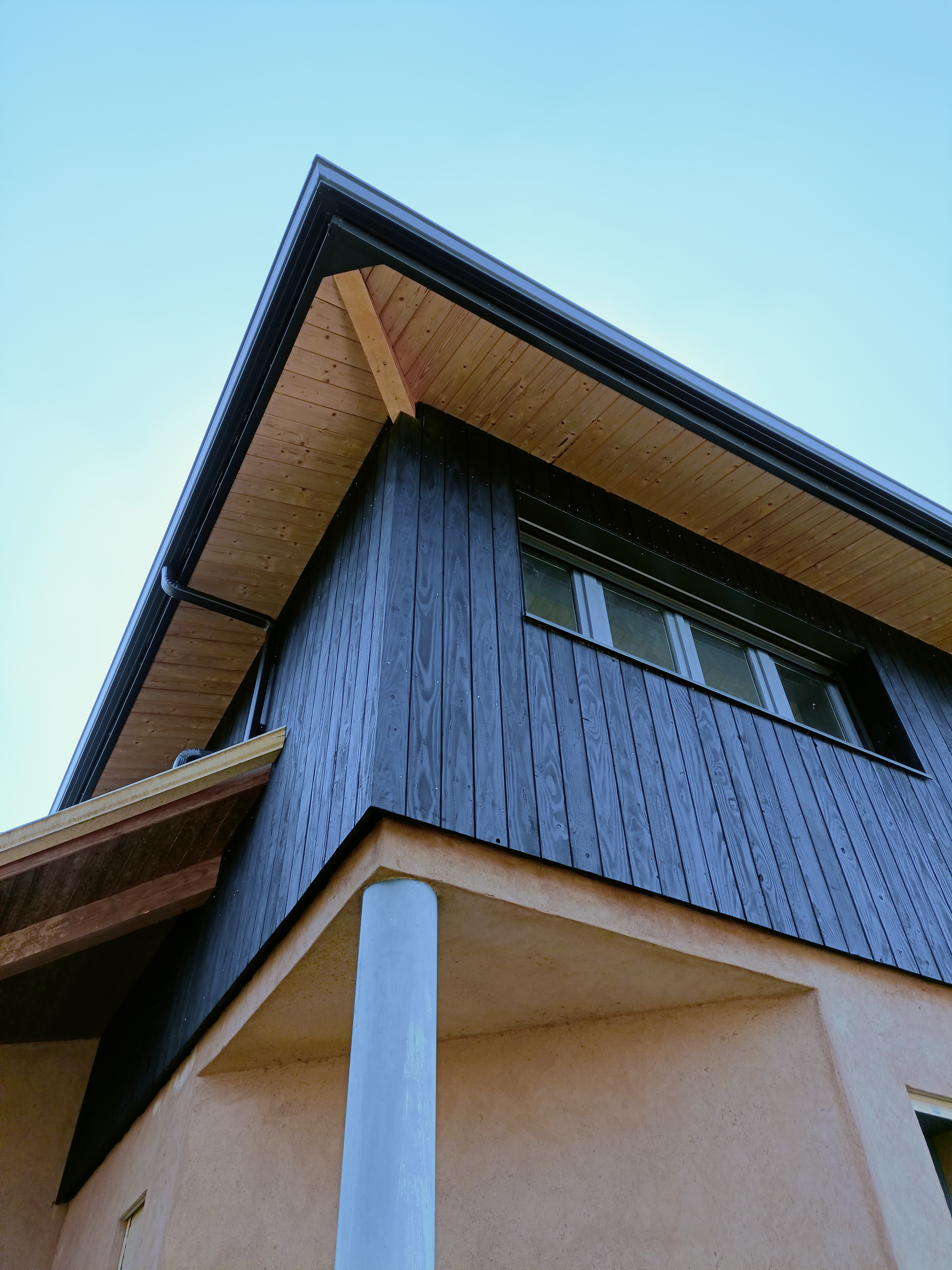 Surelevation ossature bois castelnau d estretefons bardage en bois brule